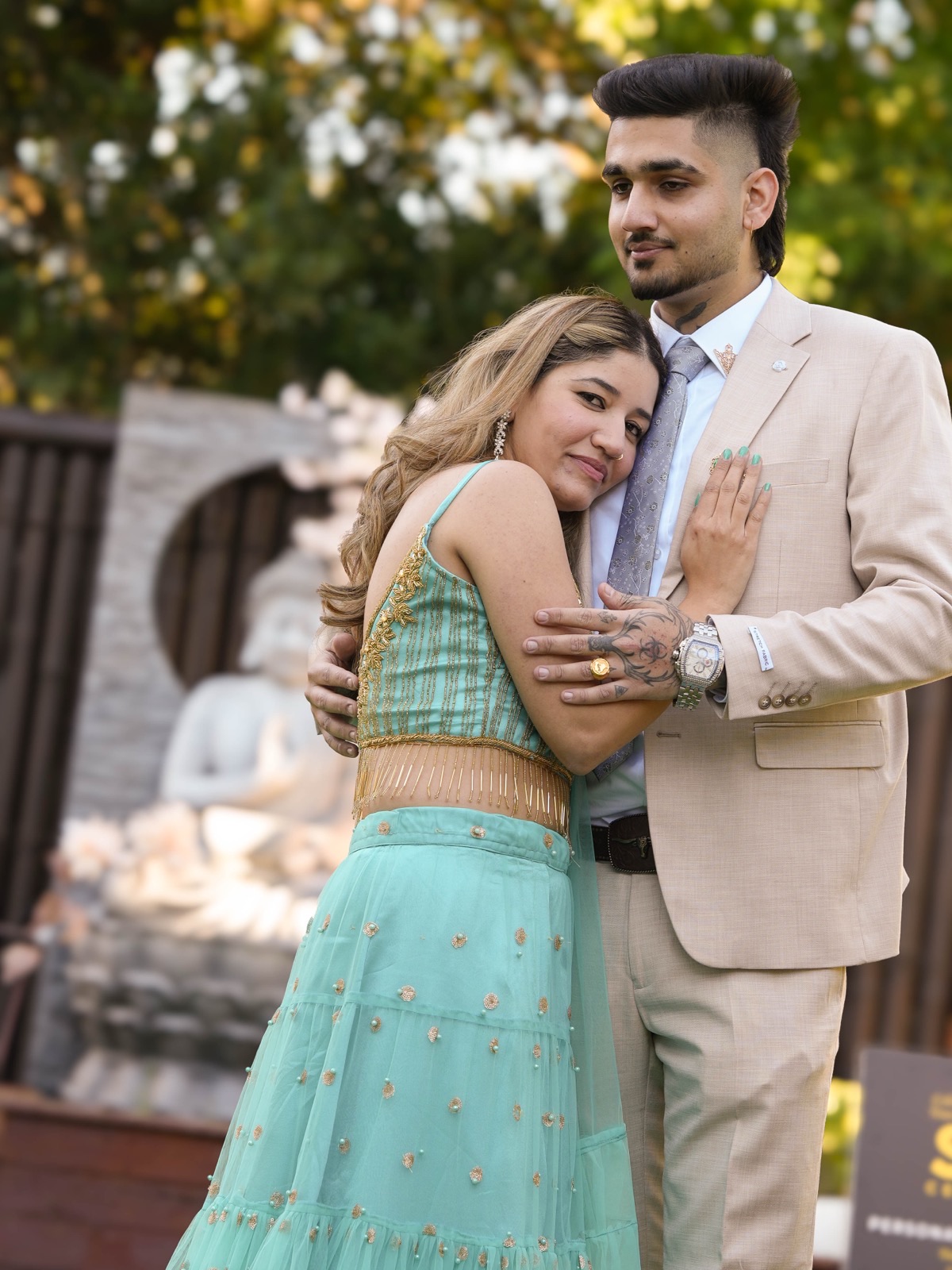 Bhavdeep and Nancy embracing at their backyard wedding in Sydney