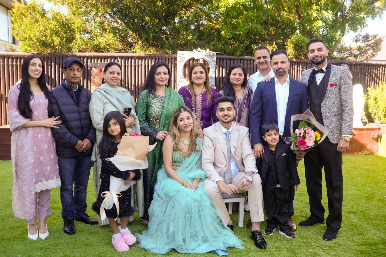Bhavdeep and Nancy surrounded by their close friends and family at their Sydney backyard wedding
