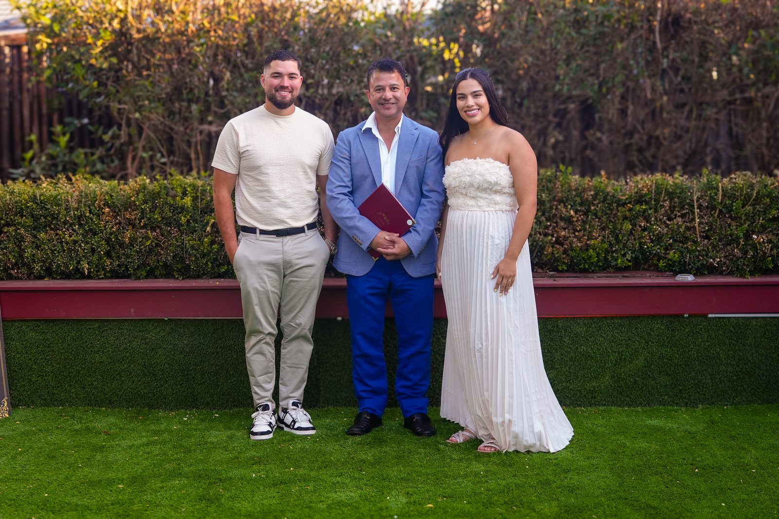 Rohit Revo with Pericles and Estafani after their garden wedding ceremony in Sydney