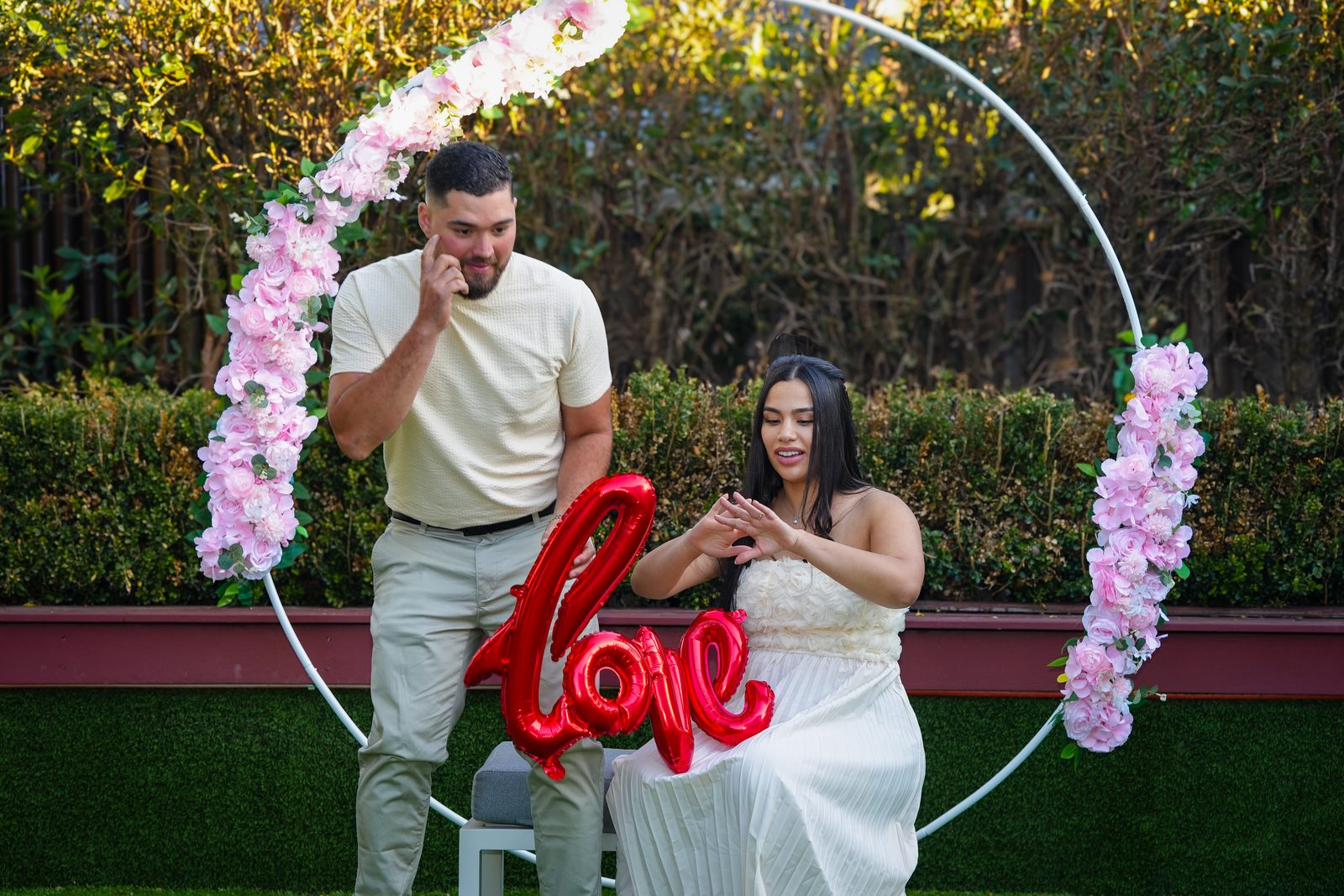 Pericles and Estafani during the ring moment at their intimate Brazilian garden wedding in Sydney