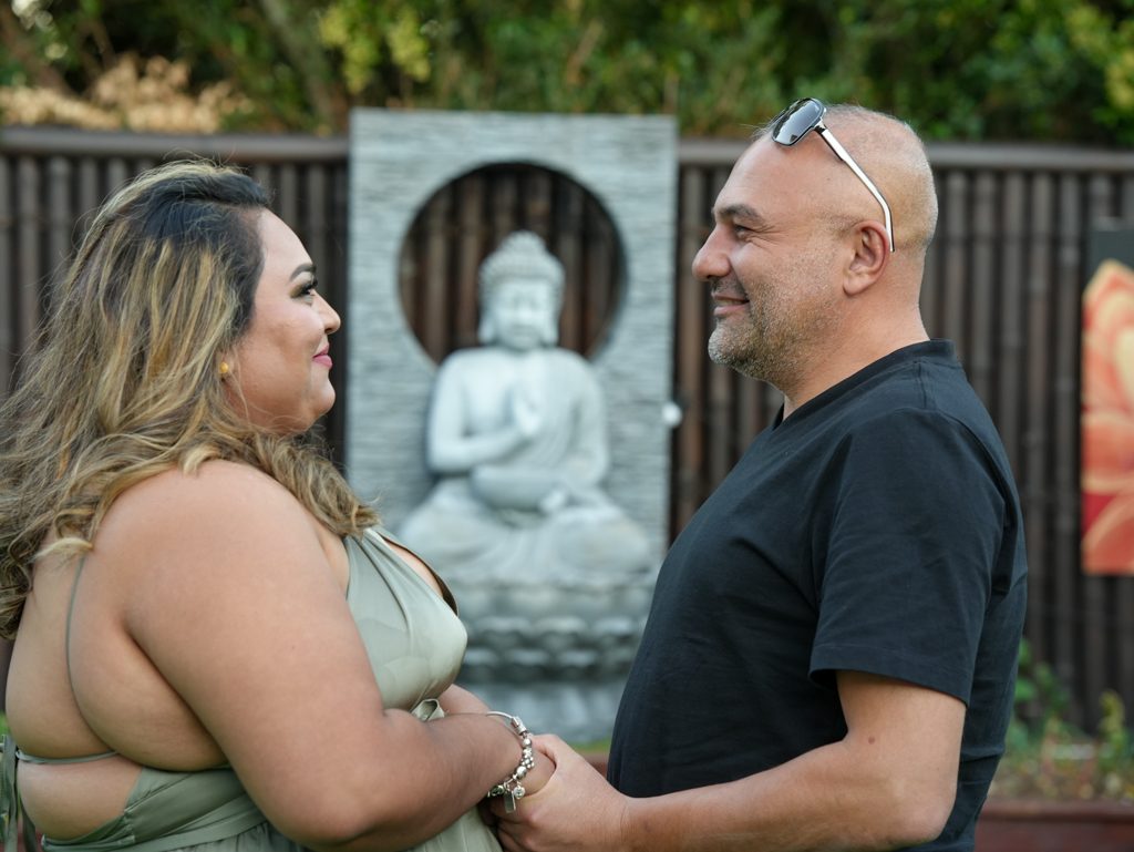 A quiet moment between newlyweds at their Fijian-Lebanese wedding in a Sydney garden