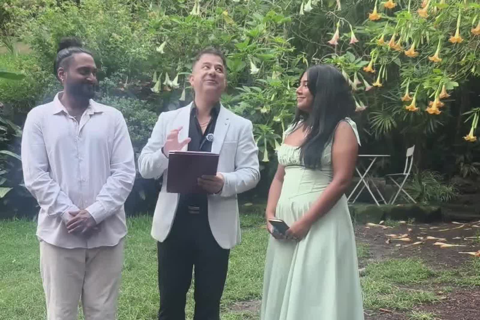 Karthik and Sivai's ceremony among the flowering trees of Wendy Whiteley's Secret Garden, overlooking Lavender Bay, Sydney