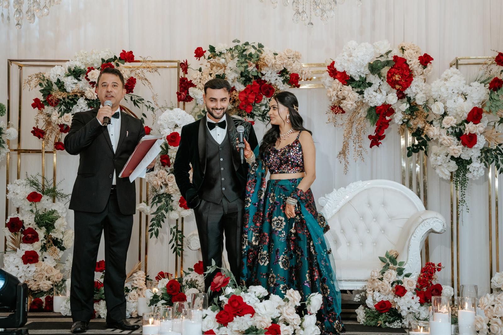 Star Celebrant conducting Aryan and Kriti's civil ceremony at their Kashmiri–Rajasthani wedding reception in Sydney