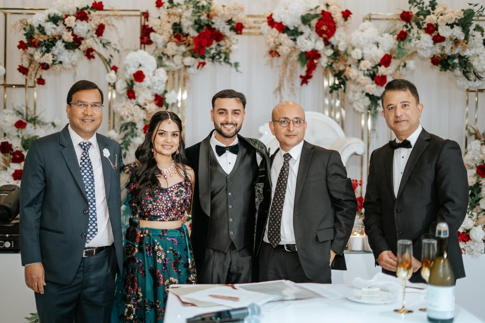 Aryan and Kriti with both their fathers, who were the witnesses, at their Sydney wedding
