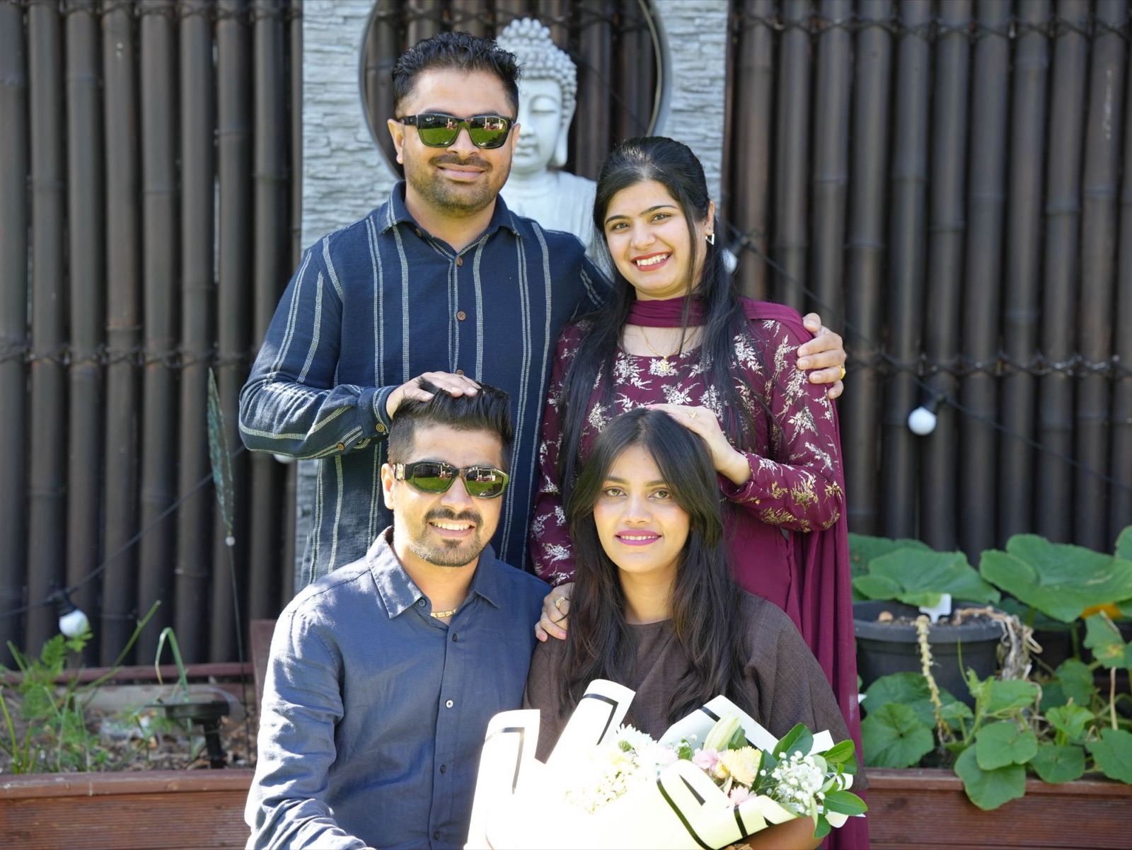 Sahil's elder brother and his wife placing their hands on Sahil and Radhika's heads in blessing at their Sydney wedding