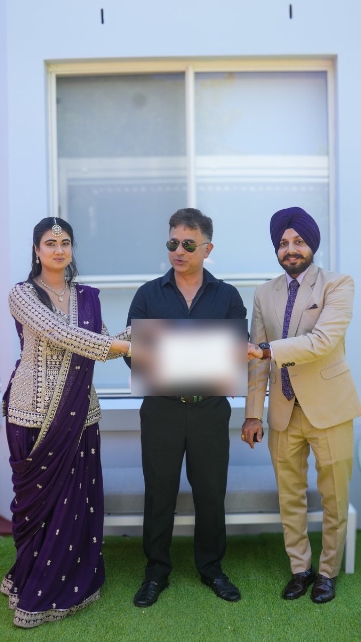 A Sikh couple with their marriage certificate at their ceremony in Bella Vista, Sydney — video